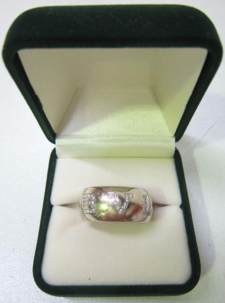 Appraisal: A BVLGARI DIAMOND RING IN CT WHITE GOLD WITH GILT