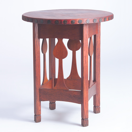 Appraisal: STICKLEY BROTHERS Lamp table with circular leather top spade-shaped cut-out