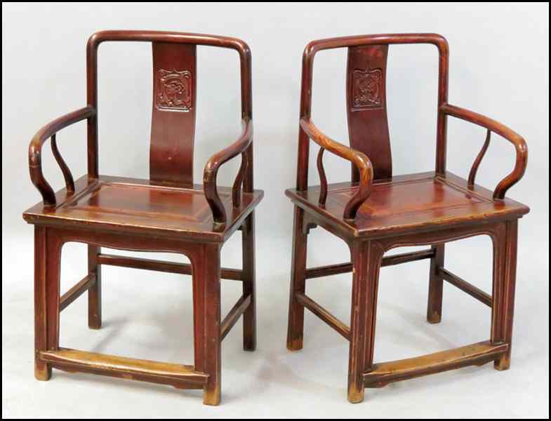 Appraisal: PAIR OF CHINESE ELMWOOD ARMCHAIRS Back height '' Condition No