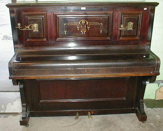 Appraisal: An upright piano