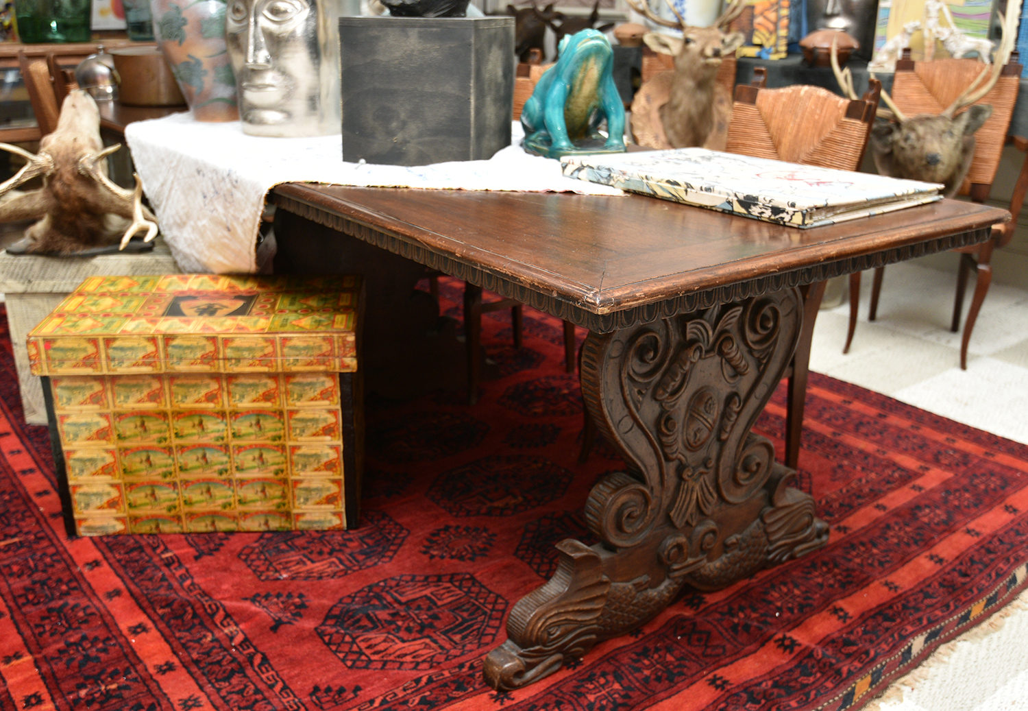 Appraisal: A CARVED GOTHIC STYLE DINING TABLE WITH STRETCHER BASE h