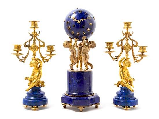 Appraisal: A French Lapis Lazuli and Gilt Bronze Clock Garniture Height