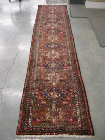 Appraisal: Heriz Persian Handmade Runner thirteen geometric medallions stylized floral trim