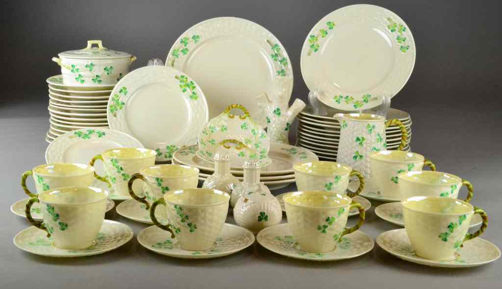 Appraisal: Pcs Beleek Shamrock Basket DinnerwareTo include cups one ''-pitcher one