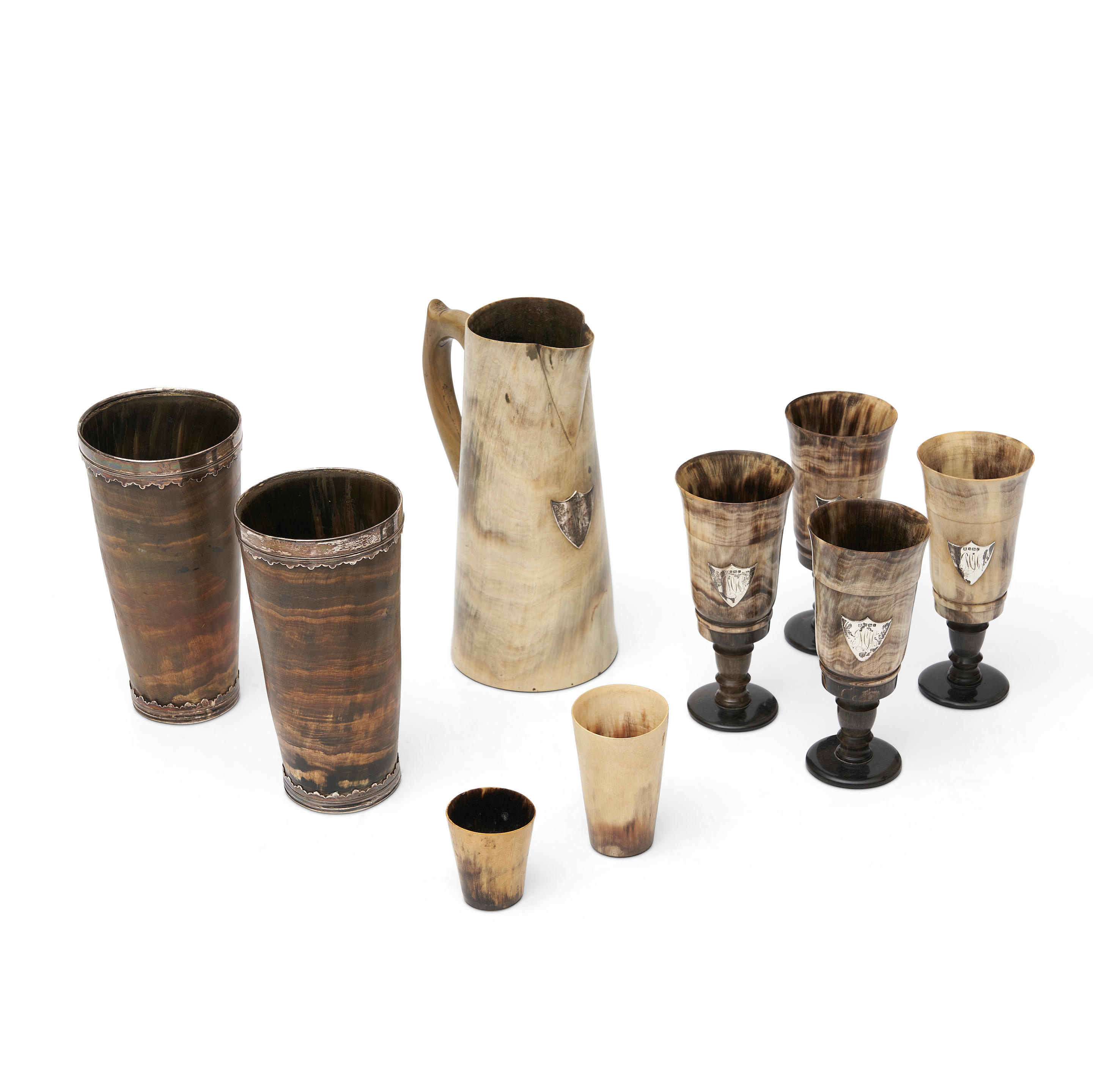 Appraisal: NINE HORN DRINKING CUPS AND A PITCHER including four English