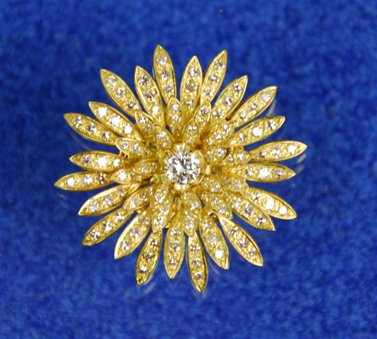 Appraisal: YELLOW GOLD AND DIAMOND FLOWER FORM PENDANT BROOCH set with