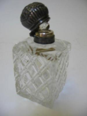 Appraisal: A LATE VICTORIAN CLEAR GLASS SCENT BOTTLE maker John Grinsell