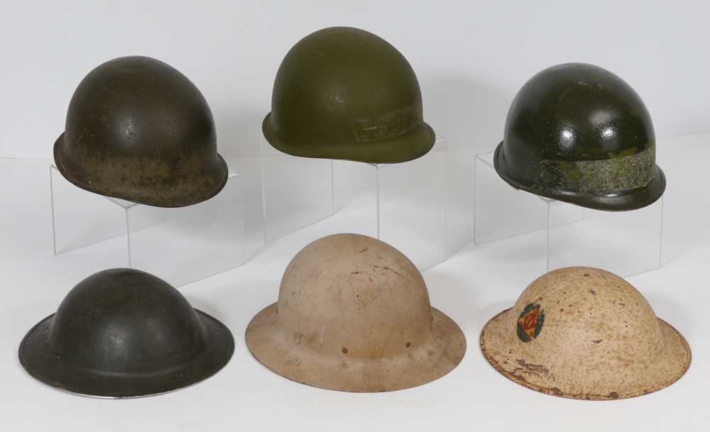 Appraisal: COLLECTION OF US MILITARY HELMETS assorted helmets from WWI doughboy