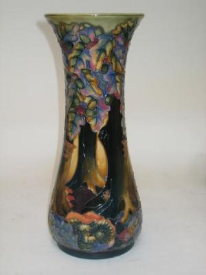 Appraisal: A MOORCROFT POTTERY VASE dated of tall waisted form tube