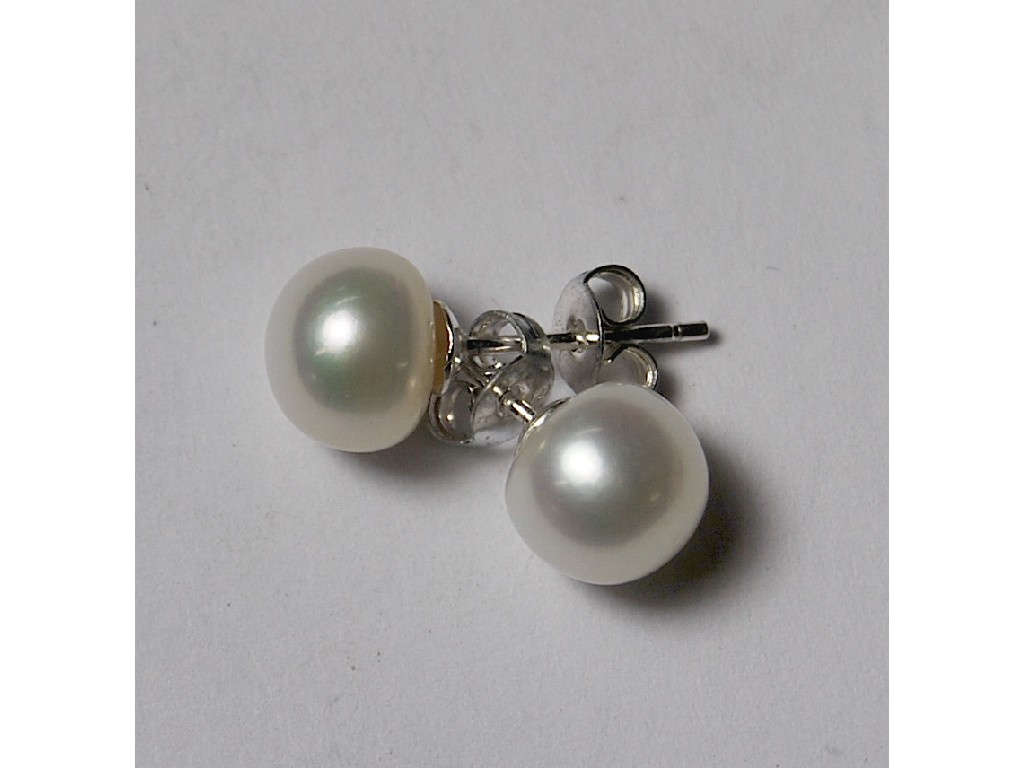 Appraisal: Pair of pearl and silver coloured metal set studs