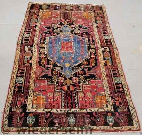 Appraisal: Persian oriental hall runner with a blue center medallion and