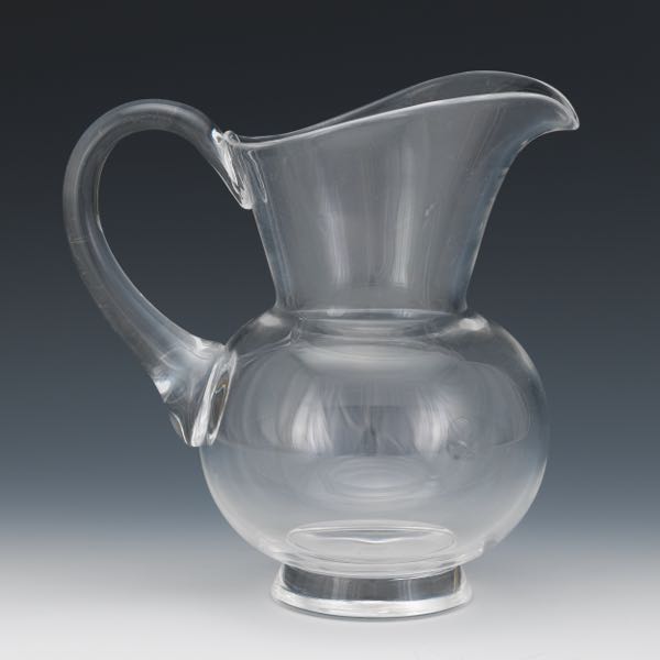 Appraisal: STEUBEN CLEAR GLASS WATER PITCHER Clear glass Steuben water pitcher