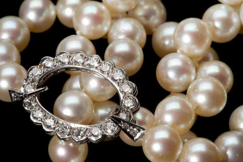 Appraisal: Platinum Diamond and Pearl Necklaceconsisting of cultured pearls - mm