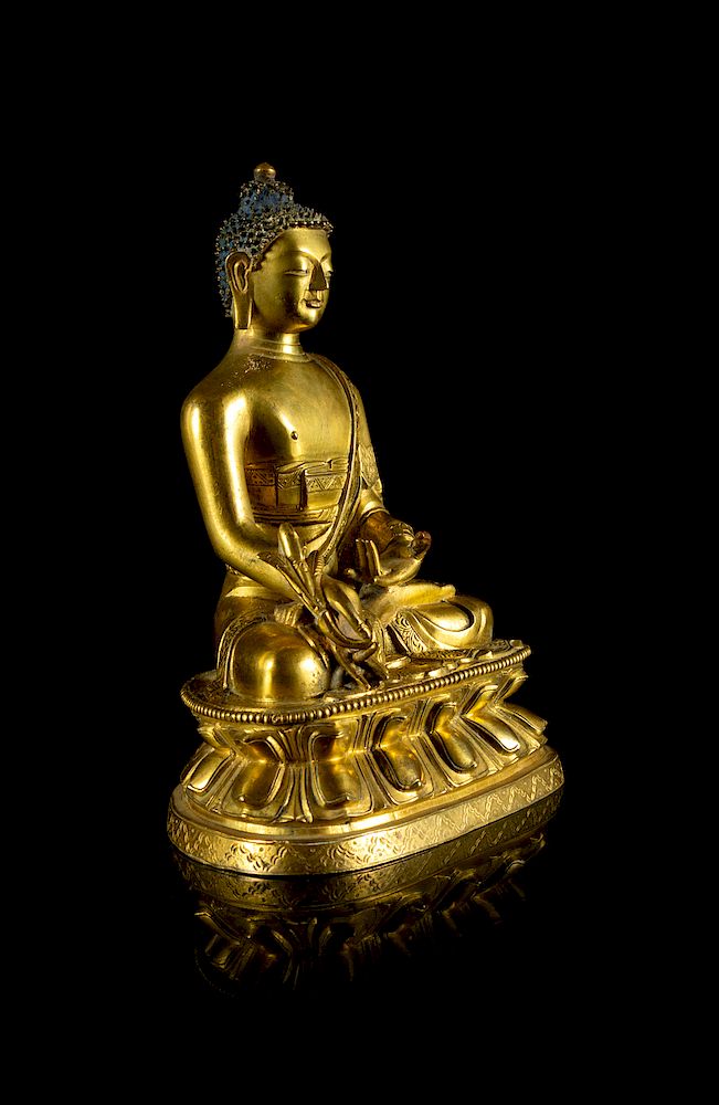 Appraisal: A Sino-Tibetan Gilt Bronze Figure of Sakyamuni Buddha Height in