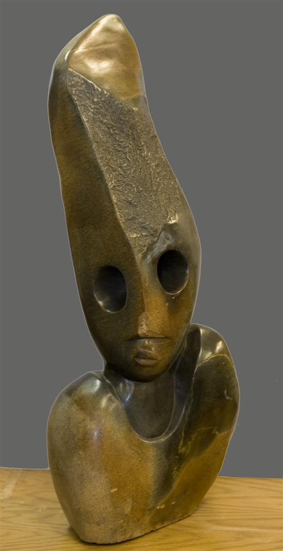 Appraisal: African polished hard stone sculpture of a face Statue having