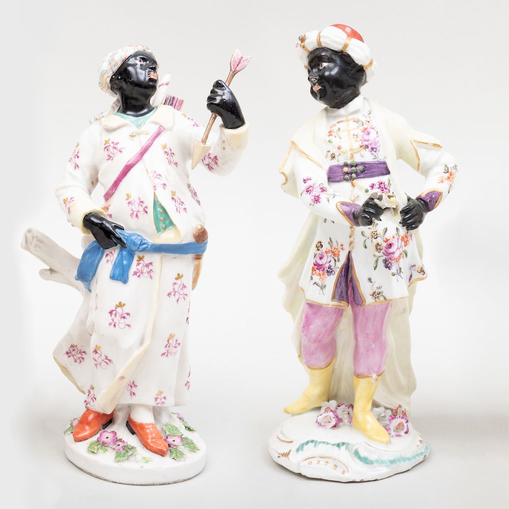 Appraisal: Chelsea Porcelain Figure of an Abyssinian Archer and a Derby