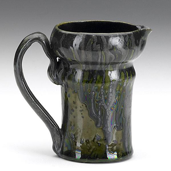 Appraisal: GEORGE OHRPitcher with gun-metal and green glazeRestoration around top and