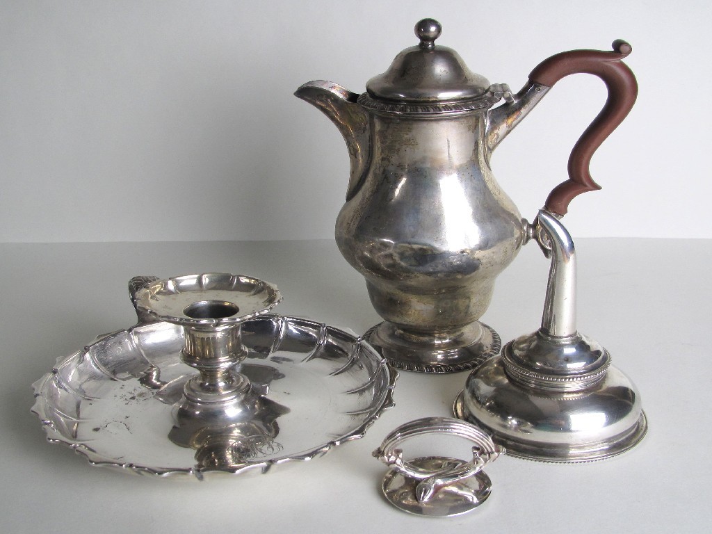 Appraisal: A silver baluster shaped chocolate pot with hinged domed cover