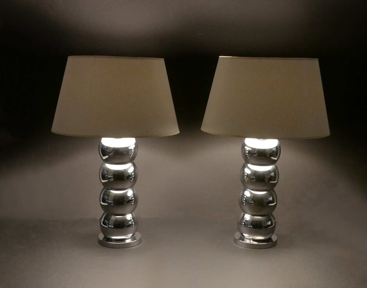 Appraisal: PAIR MID-CENTURY MODERN CHROMED LAMPS Pair of single light chromed