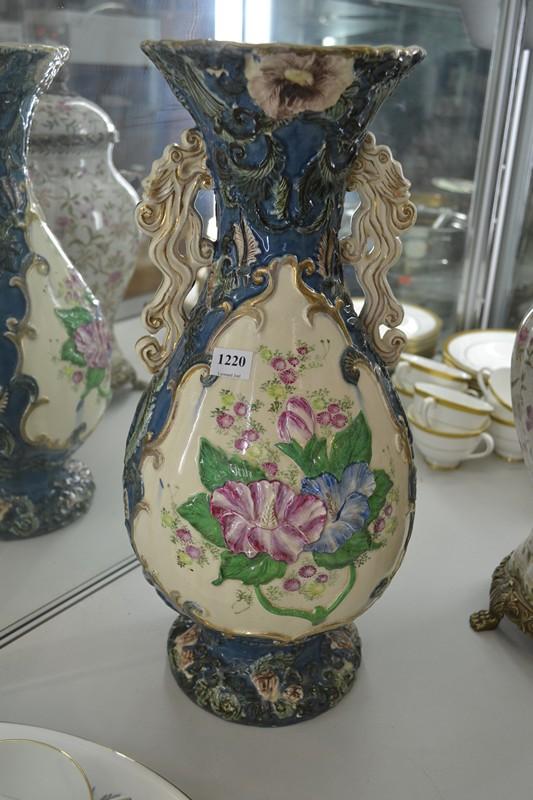 Appraisal: LARGE TH CENTURY STAFFORDSHIRE FLORAL RELIEF VASE WITH DRAGON HANDLES