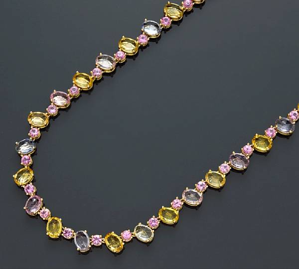 Appraisal: A multi-color sapphire necklace Nardi set with reverse-set oval and