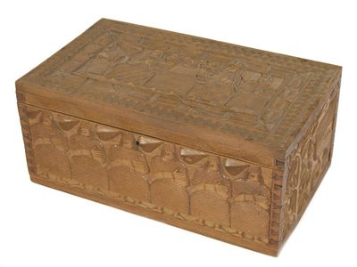 Appraisal: A Burmese hardwood marriage chest allover carved with figures snakes