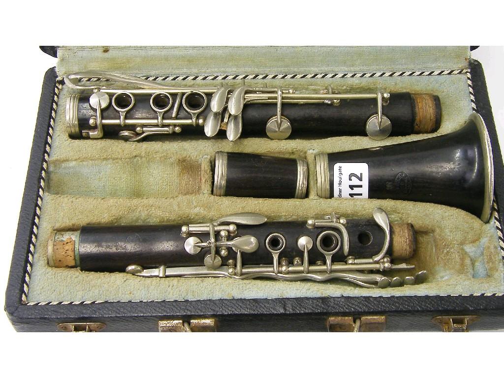 Appraisal: American rosewood clarinet by and stamped The Pedler Co Elkhart