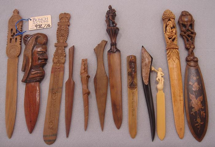 Appraisal: Lot of vintage hand carved wooden letter openers Including figural