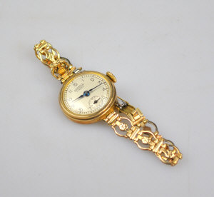 Appraisal: A lady's ct gold Roamer wristwatch on unmarked decorative bracelet