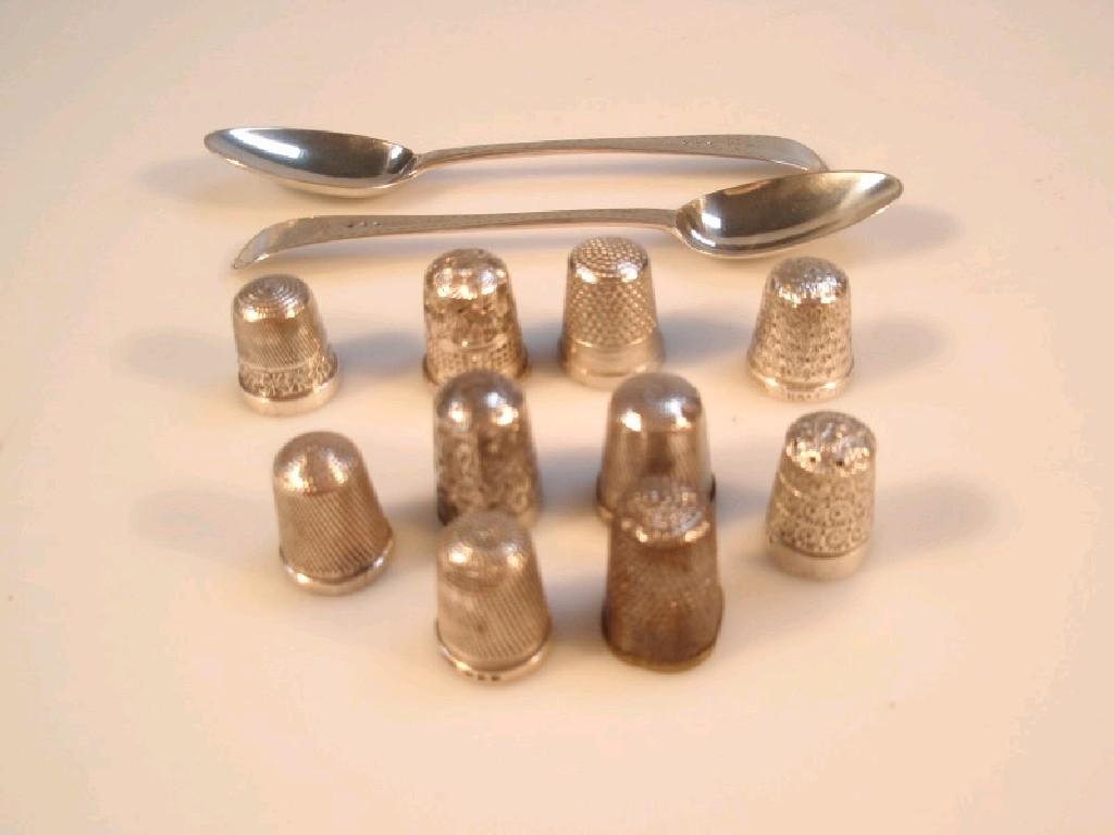 Appraisal: A collection of ten silver thimbles and pair of George