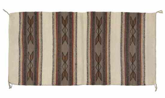 Appraisal: A Navajo Weaving Wide Ruins having double saddle blanket banded