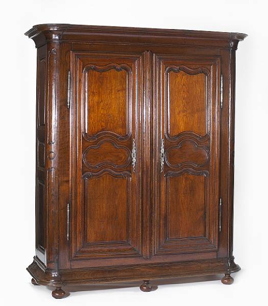 Appraisal: A Louis XIV oak armoire early th century The cove