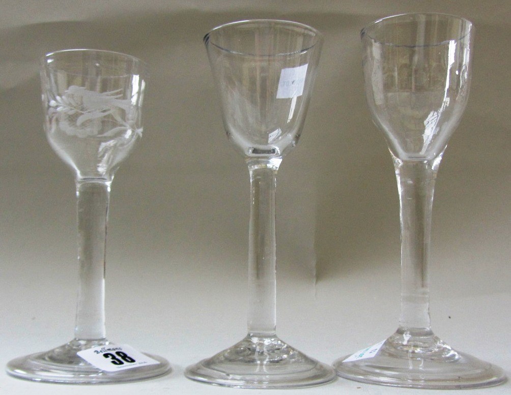 Appraisal: Three plain stemmed wine glasses mid th century one with