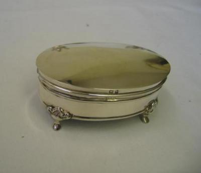 Appraisal: AN EDWARDIAN JEWEL BOX of plain oval form with mildly