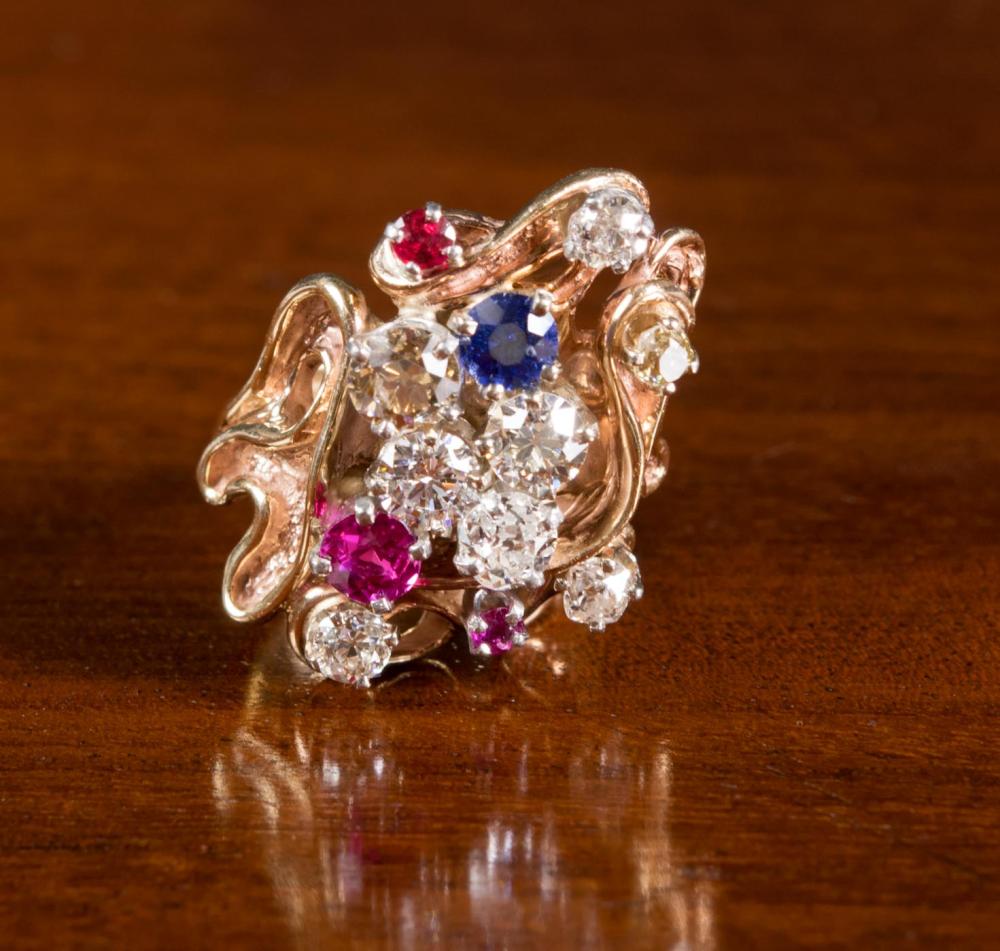 Appraisal: DIAMOND SAPPHIRE RUBY AND FOURTEEN KARAT GOLD RING The k