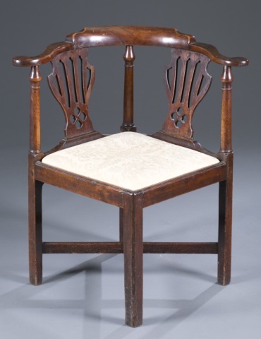 Appraisal: th c Corner Chair Mahogany Curved arms pierced splat block-form