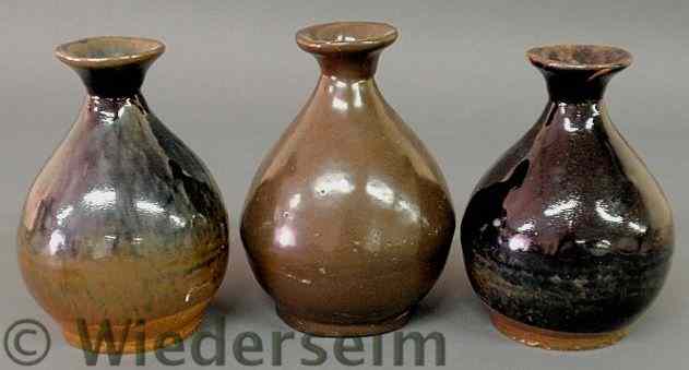 Appraisal: Three glazed ceramic vases th th c each approx h