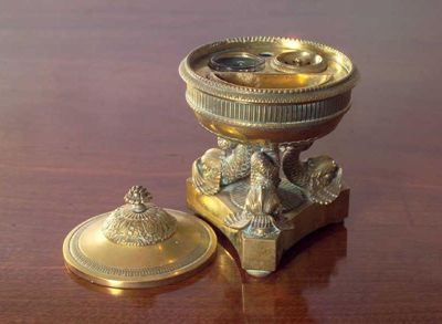 Appraisal: A th century brass inkstand the cover enclosing a fitted