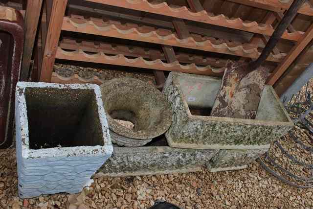 Appraisal: A SET OF THREE WEATHERED CONCRETE RECTANGULAR PLANTERS and two