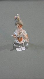 Appraisal: A German porcelain Art Deco half doll in the style