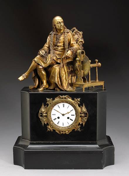 Appraisal: A French bronze and slate figural mantel clock of American