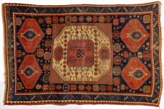 Appraisal: Caucasian Kazak Carpet Caucasian Kazak carpet wool on wool central