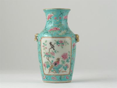 Appraisal: A small Chinese famille rose vase painted with two panels