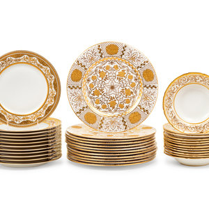 Appraisal: Three Sets of Gilt Decorated Porcelain Plates th Century comprising