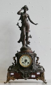 Appraisal: A French late th century mantle clock surrounded by the