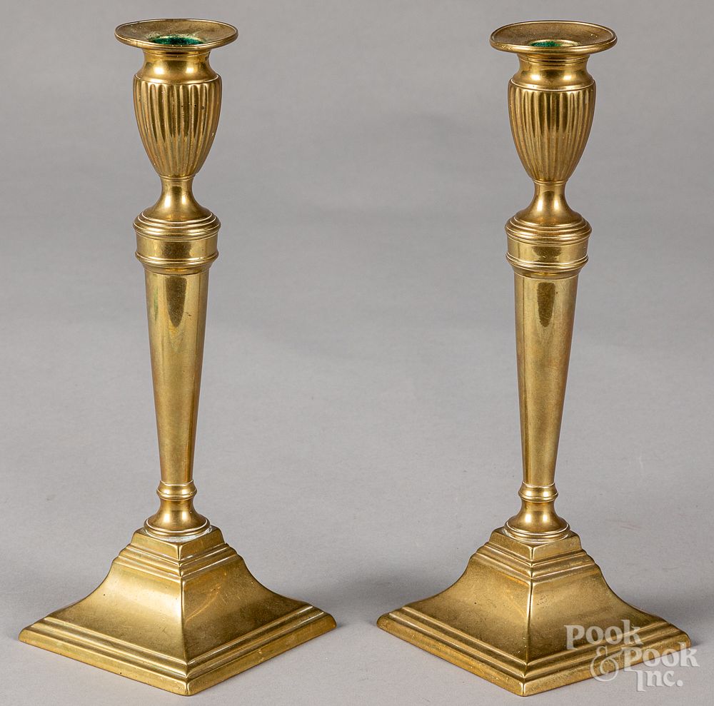 Appraisal: Pair of English brass candlesticks Pair of English brass candlesticks