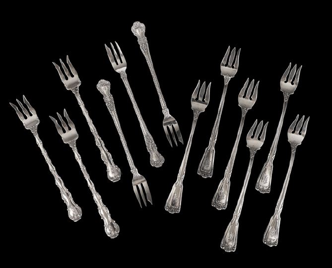 Appraisal: Twelve Assorted Sterling Silver Seafood Cocktail Forks including three in