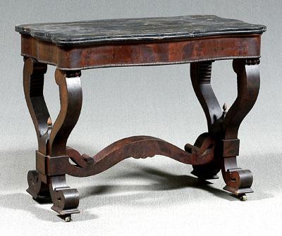 Appraisal: Classical marble-top center table cartouche-shaped black Egyptian marble conforming skirt