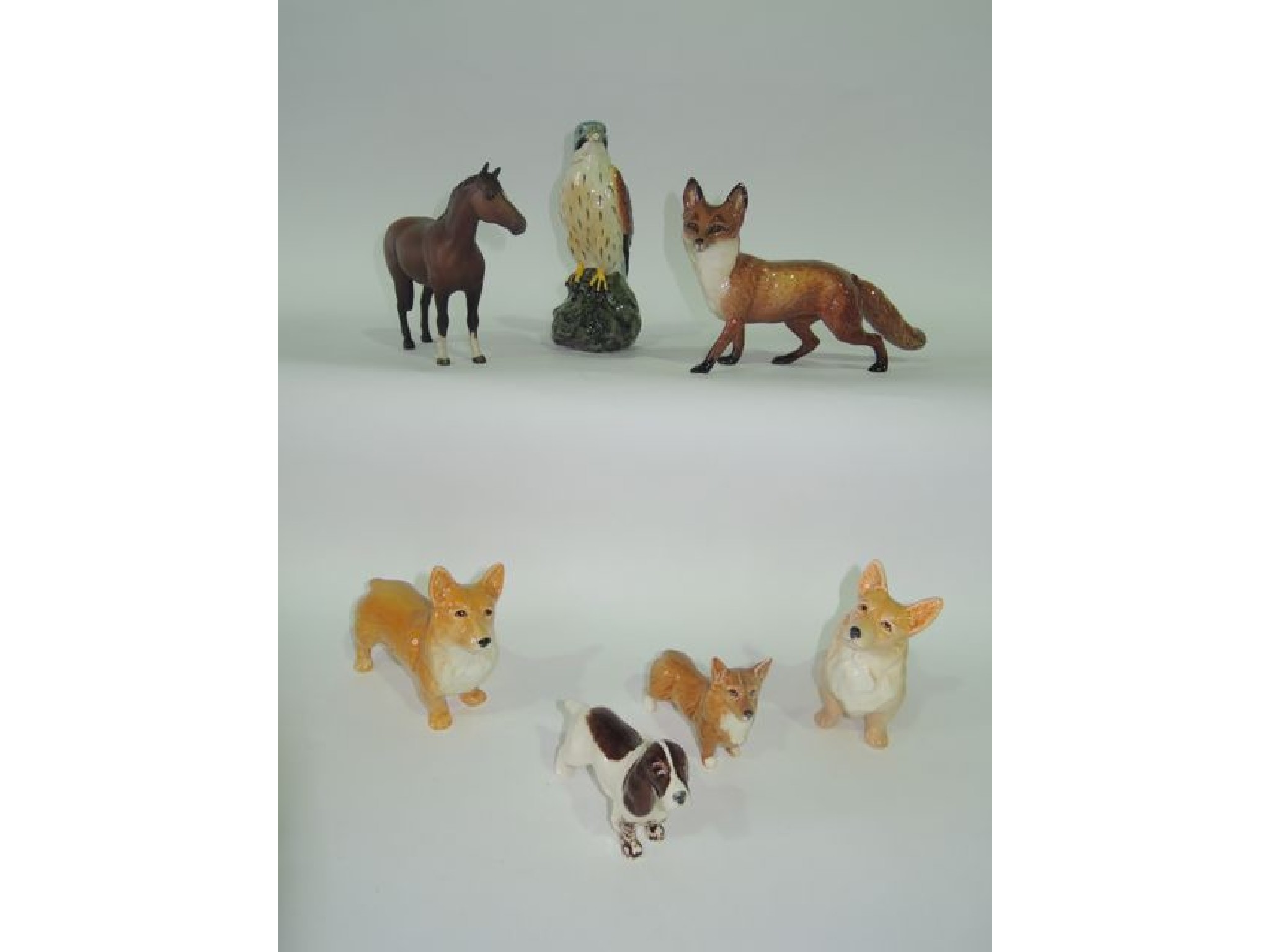 Appraisal: A collection of ceramic figures including Beswick animals comprising a