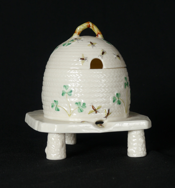 Appraisal: IRISH BELLEEK PORCELAIN HONEY POT Green mark Decorated with shamrocks